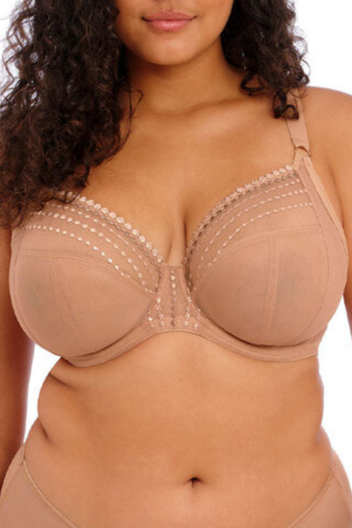 Miękki beżowy biustonosz na fiszbinie typu plunge ozdobiony delikatnym haftem