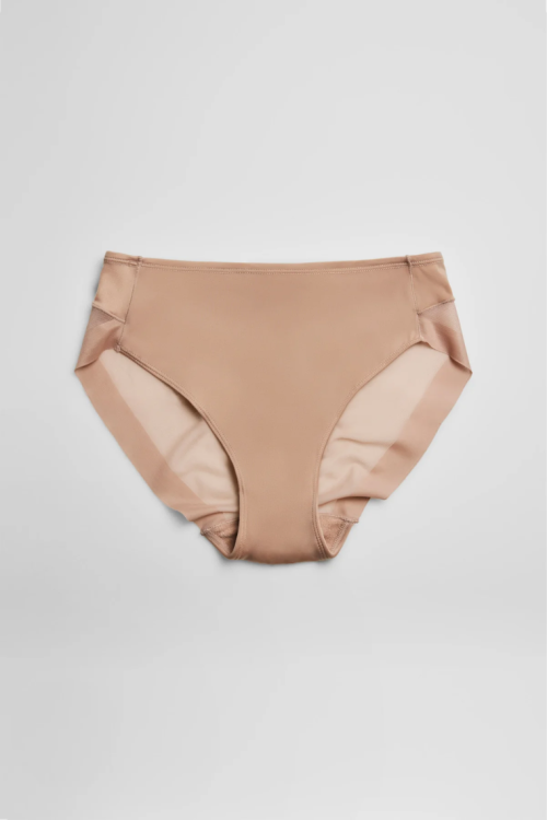 Bezszwowe figi beżowe z tyłem z siateczki